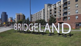 a metal sign that says Bridgeland