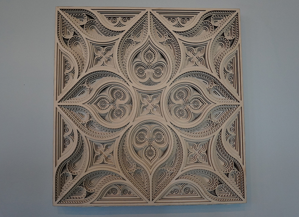 a laser mandala cut out of wood at Fuse 33 makerspace
