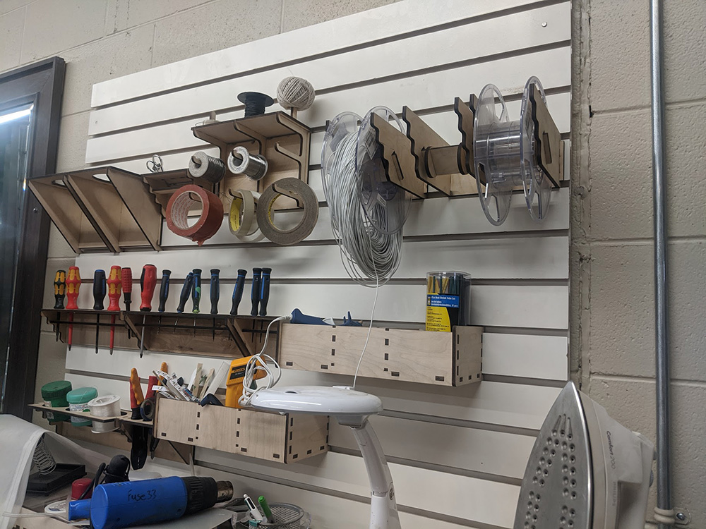 a photo of a tool storage area where all the boxes and storage and made from laser cut boxes created at fuse 33 makerspace