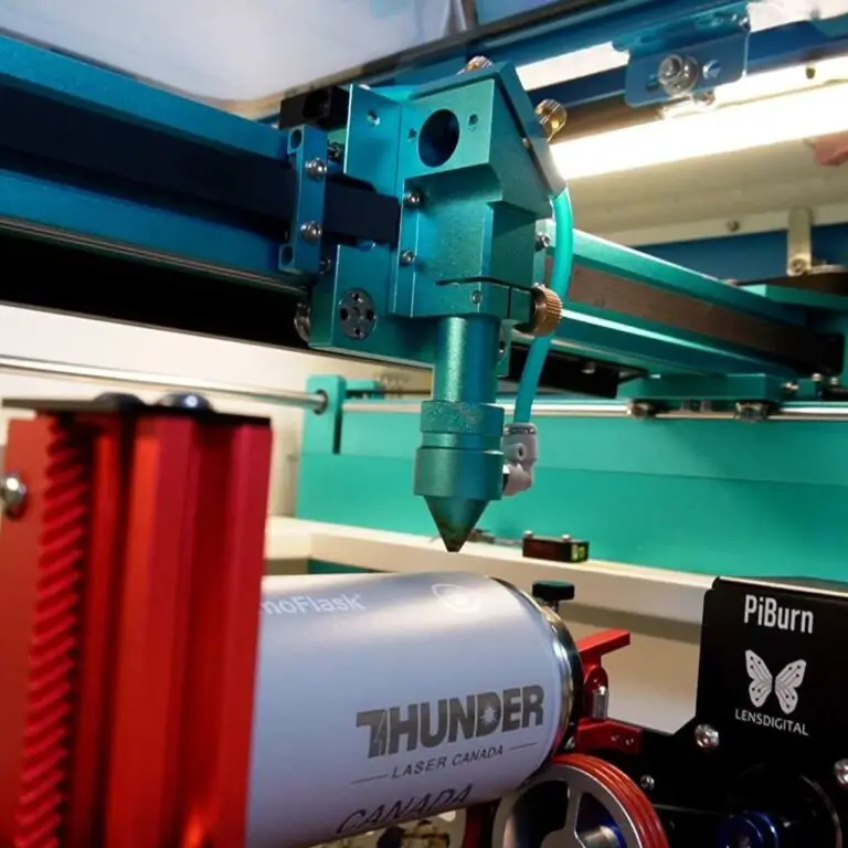 thunder laser engraving a water bottle at fuse33 makerspace-manufacturing services