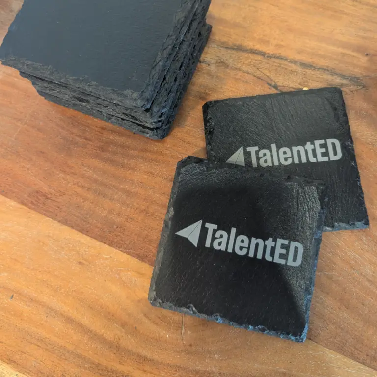 slate laser engraved coasters calgary that say Talent Ed on them